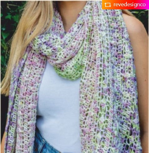 colour sample of crochet shawl being worked on showing colour changes