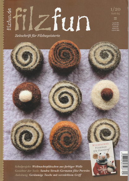 Cover of the German craft magazine 'filzfun' from October 2001 (Heft 65). The cover features a grid of nine hand-felted rolls of cinnamon and nutmegs on a lavender background, with a brown header containing the white title 'filzfun'.